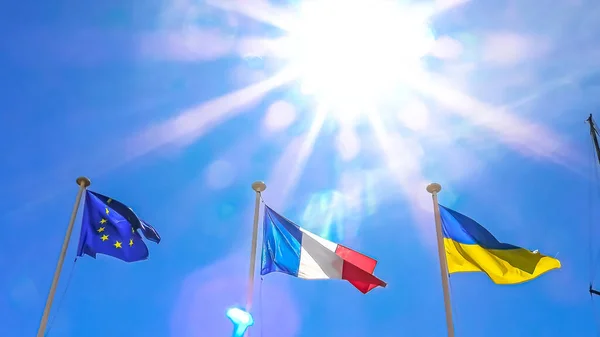 Ukraine flag and France flag united — стокове фото