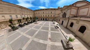 Ajaccio, Corsica, France - June 2022: Aerial view of Fesch museum yard with statue of cardinal Fesch and Imperial Chapel or Palatine Chapel. Ajaccio capital city of Corsica island. HYPER-LAPSE.