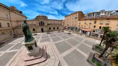 Ajaccio, Corsica, France - June 2022: Aerial view of Fesch museum yard with statue of cardinal Fesch and Imperial Chapel or Palatine Chapel. Ajaccio capital city of Corsica island.