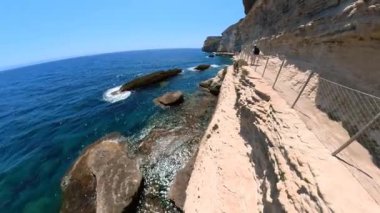 Corsica, France - June, 2022: Aerial view of the cliffs on the Bonifacio city and King Aragon steps in Corsica of France. Drone view of the stairway Escalier du Roy Aragon on Bonifacio bay.