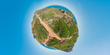 tiny planet of the Sanguinaires islands of Ajaccio town in Corsica island of France. Aerial view of the seascape with the island cliffs and hills in Corsica sea and Mediterranean sea.