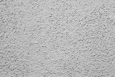 Kabataslak desenli boyalı bir duvar. Fırça desenli gri alçı, ev duvarı, kopyalama alanı