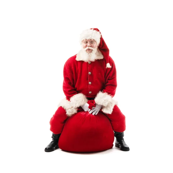 Santa Claus Sentado Bolsa Regalo Navidad Aislado Sobre Fondo Blanco — Foto de Stock