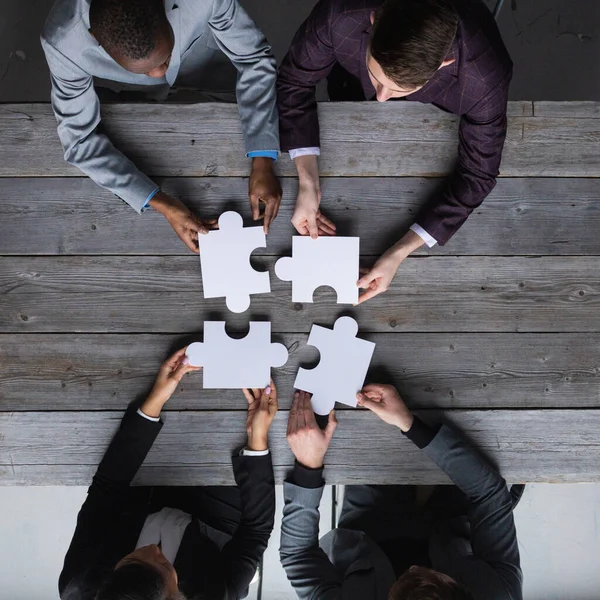 Diverse Team People Assembling Jigsaw Puzzle Multiracial Group Black White — Stock Photo, Image