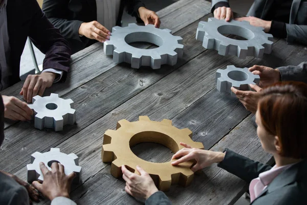 Group Businesspeople Joining Together Gears Table Workplace — Stock Photo, Image