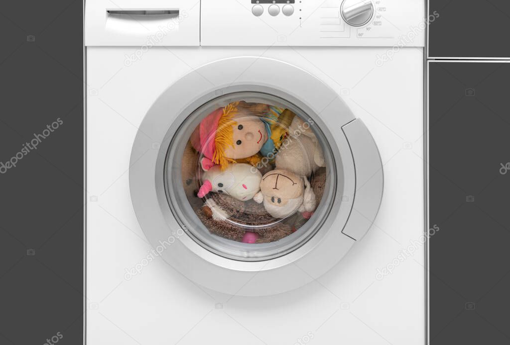 Childrens toys in the washing machine.
