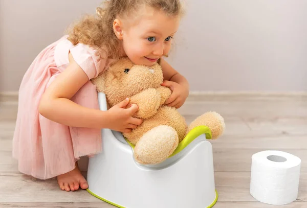 Child Teaches Toy How Use Potty — Stock Photo, Image