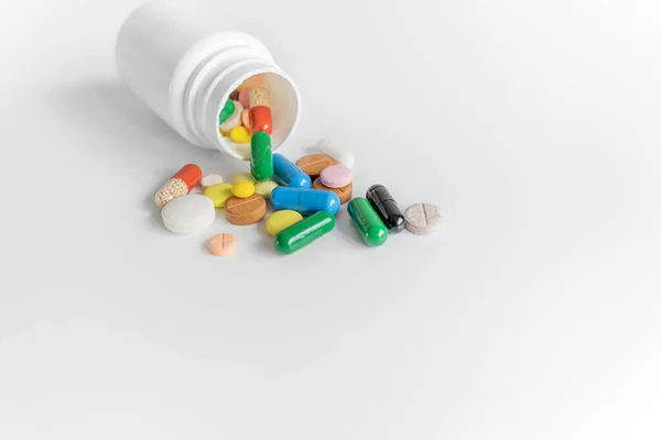 Bottle Multi Colored Pills White Background —  Fotos de Stock
