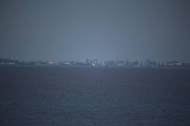 View over the river Severn from Clevedon in England to the city of Cardiff in South Wales