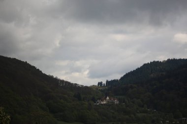 Sweeping views over the tree lined and occasionally snowy valleys and hills of the Black forest around Badenweiler in southern Germany near the border with Switzerland at the heart of Europe