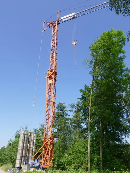 Electric construction crane on a construction site