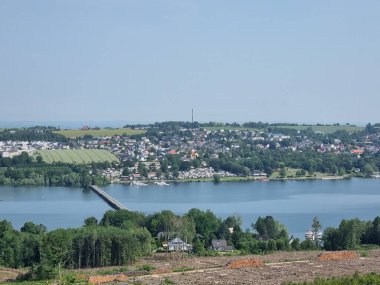 View from the Moehne Lake tower to the Moehne Lake, North Rhine-Westphalia, Germany, on the left the pedestrian bridge over the lake, opposite Koerbecke, the main town of the municipality of Moehnesee