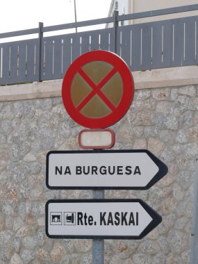 No parking sign and indication of tourist destinations in Genova, Mallorca, Balearic Islands, Spain