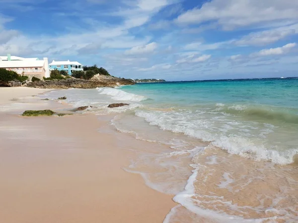 One of the beautiful beaches of Grand Bermuda is John Smith\'s bay with crisp white and pink sand and turquoise clear water