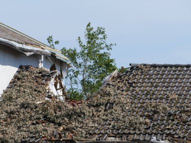 In May 2022, a tornado caused severe damage in Lippstadt, North Rhine-Westphalia, Germany, here the open roof of a school