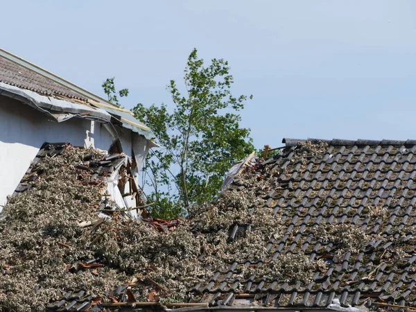 In May 2022, a tornado caused severe damage in Lippstadt, North Rhine-Westphalia, Germany, here the open roof of a school
