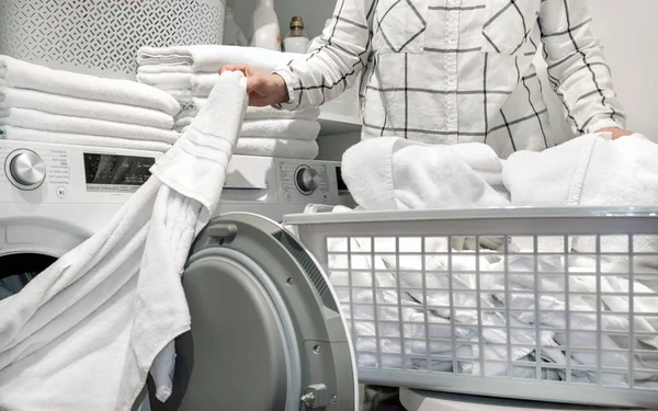 Female Hands Hold Towels Wash Dry Machines Laundry — Stock Photo, Image