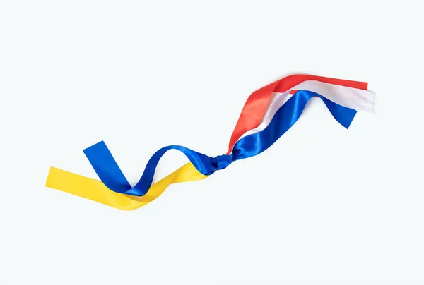 Dwie Flagi Holandia Ukraina Przywiązane Węzła Białym Tle Przyjaźń Darowizna — Zdjęcie stockowe