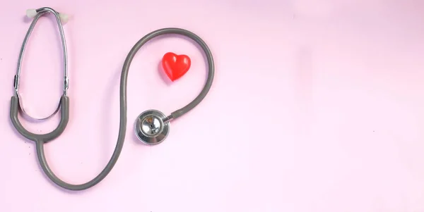 Top View Stethoscope Red Hearts Pink Background Health Care Concept — Stockfoto