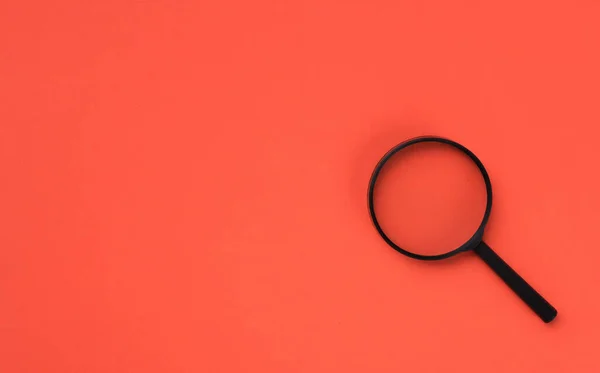 Loupe Magnifying Glass Internet Search Symbol Orange Background Copy Space — Foto Stock