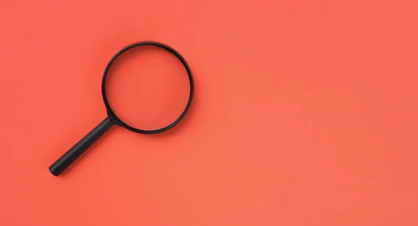 Loupe Magnifying Glass Internet Search Symbol Orange Background Copy Space — Foto Stock