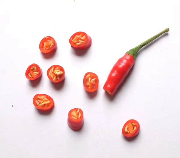 Ripe Red Hot Chili Peppers Cut Pieces Vegetable Isolated White — ストック写真