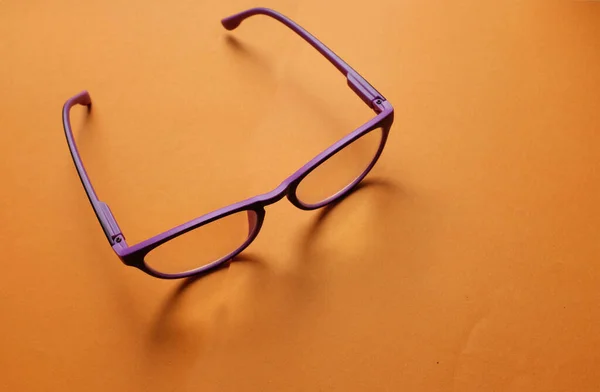 Copy Space Purple Framed Eyeglasses Isolate Aorange Background — Foto Stock