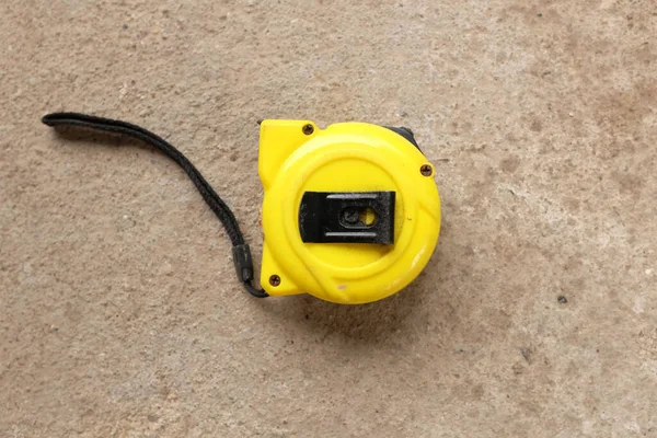 Flat Lay Top View One Yellow Tape Measure Cement Background — ストック写真