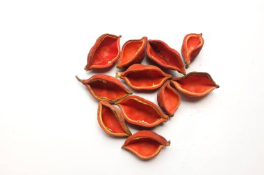 top view and flat lay a red peel of chestnuts (Sterculia monosperma)  isolate on a white background.