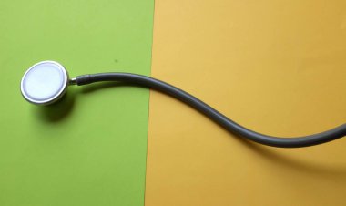 Stethoscope or phonendoscope, medical device for auscultation, medical medical device on on the doctor's table. Healthcare concept.Background for doctor's day or international nurses day. 