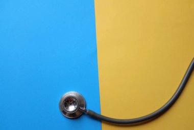 Stethoscope or phonendoscope, medical device for auscultation, medical medical device on on the doctor's table. Healthcare concept.Background for doctor's day or international nurses day. 
