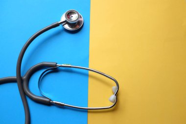 Stethoscope or phonendoscope, medical device for auscultation, medical medical device on on the doctor's table. Healthcare concept.Background for doctor's day or international nurses day. 