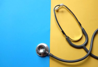 Stethoscope or phonendoscope, medical device for auscultation, medical medical device on on the doctor's table. Healthcare concept.Background for doctor's day or international nurses day. 