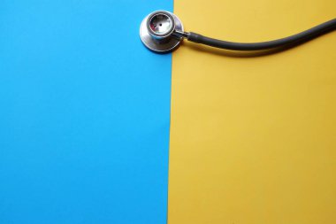 Stethoscope or phonendoscope, medical device for auscultation, medical medical device on on the doctor's table. Healthcare concept.Background for doctor's day or international nurses day. 