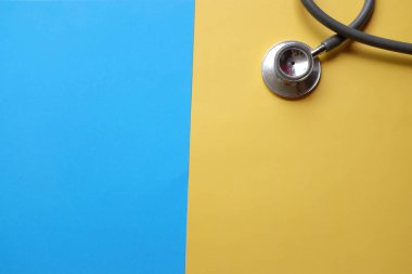 Stethoscope or phonendoscope, medical device for auscultation, medical medical device on on the doctor's table. Healthcare concept.Background for doctor's day or international nurses day. 