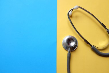 Stethoscope or phonendoscope, medical device for auscultation, medical medical device on on the doctor's table. Healthcare concept.Background for doctor's day or international nurses day. 