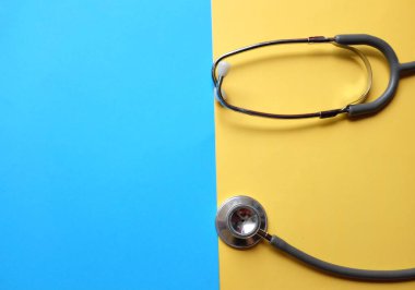 Stethoscope or phonendoscope, medical device for auscultation, medical medical device on on the doctor's table. Healthcare concept.Background for doctor's day or international nurses day. 