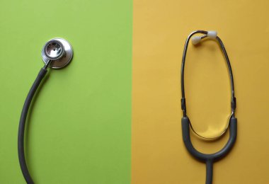 tpp view a Stethoscope or phonendoscope, medical device for auscultation, medical medical device on on the doctor's table. Healthcare concept.Background for doctor's day or international nurses day. 