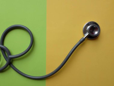 Stethoscope or phonendoscope, medical device for auscultation, medical medical device on on the doctor's table. Healthcare concept.Background for doctor's day or international nurses day. 