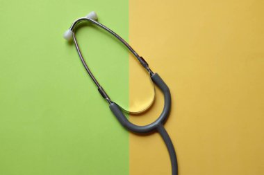 Stethoscope or phonendoscope, medical device for auscultation, medical medical device on on the doctor's table. Healthcare concept.Background for doctor's day or international nurses day. 