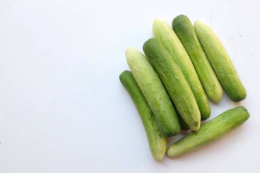 close up and top view fresh organic raw cucumber vegetables isolate on a white background.food and nutrition concept.