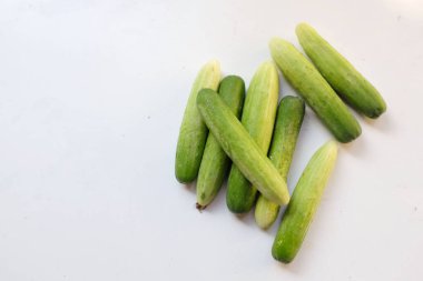 close up and top view fresh organic raw cucumber vegetables isolate on a white background.food and nutrition concept.