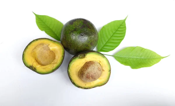 Bovenaanzicht Vlakke Lay Van Avocado Fruit Tweeën Gesneden Groen Blad — Stockfoto