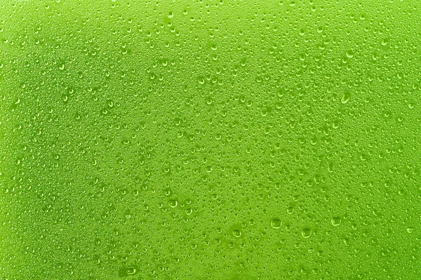 Πράσινο φόντο με σταγόνες νερού close-up — Φωτογραφία Αρχείου