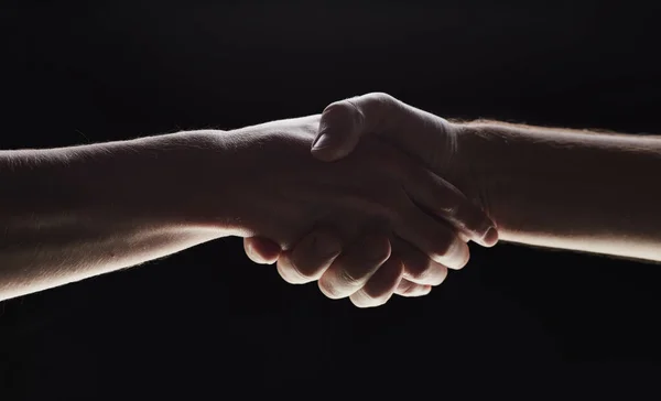 Photo Two Men Shaking Hands Black Background — Zdjęcie stockowe