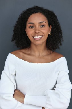 Beautiful female african american business woman CEO in a suit at the workplace