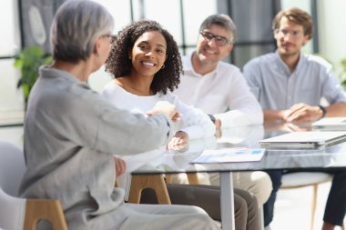discussion of business people in the office sitting at the table