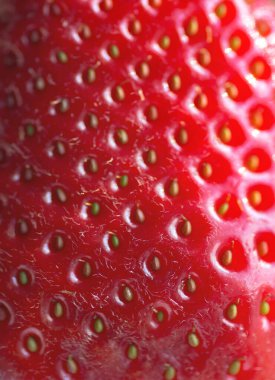 desen arka plan kırmızı sulu çilek makro yüzeyi tohumlu