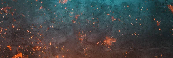 コンクリートの抽象的な青の背景に炎の粒子が — ストック写真