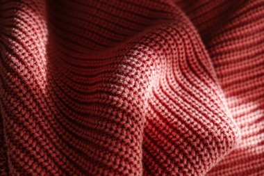 Pembe süveter ya da eşarp deseni yakın plan..